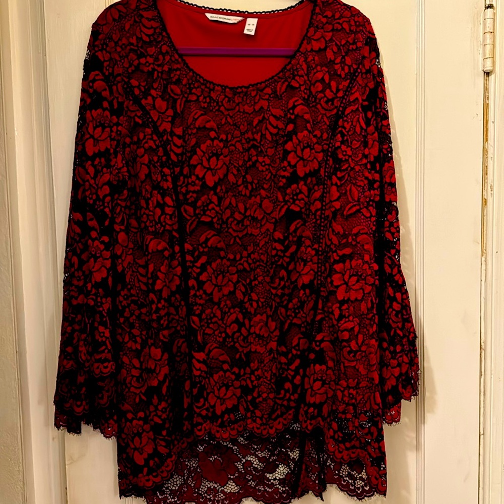 Beautiful maroon with black trim pull over top. Bell sleeves, lace overlay.